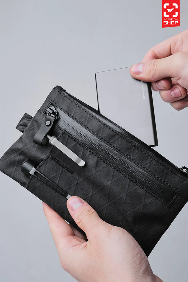 Alpaka - Zip Clutch